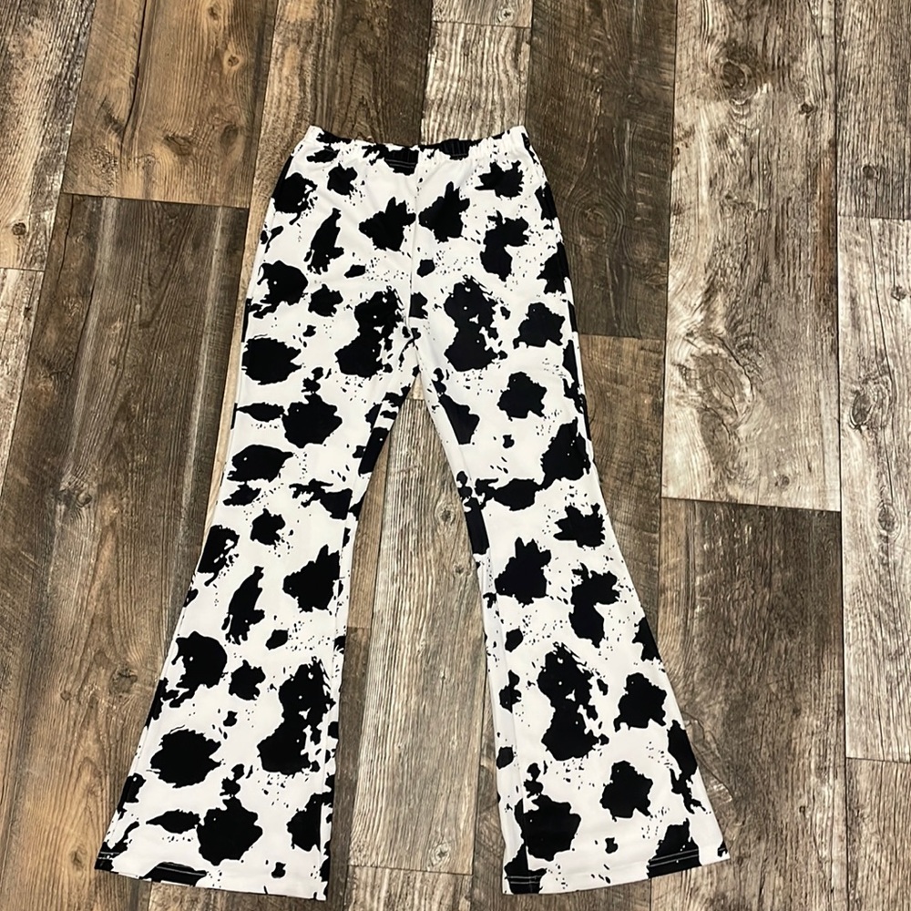 Size small women’s cow print bell bottom leggings